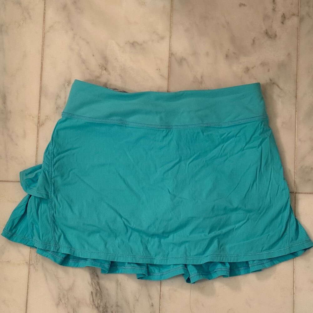 Blue Ivivva skirt with shorts underneath